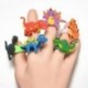 2PCS aranyos dinoszaurusz ujj gyűrű PVC puha rajzfilm dinoszaurusz gyűrűk gyerekek játék ajándék