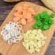 Szín: te yu quan - Szimuláció Élelmiszer Mesterséges Zöldségek Paprika Sonka Kolbász Szeletelt Fokhagyma Tintahal